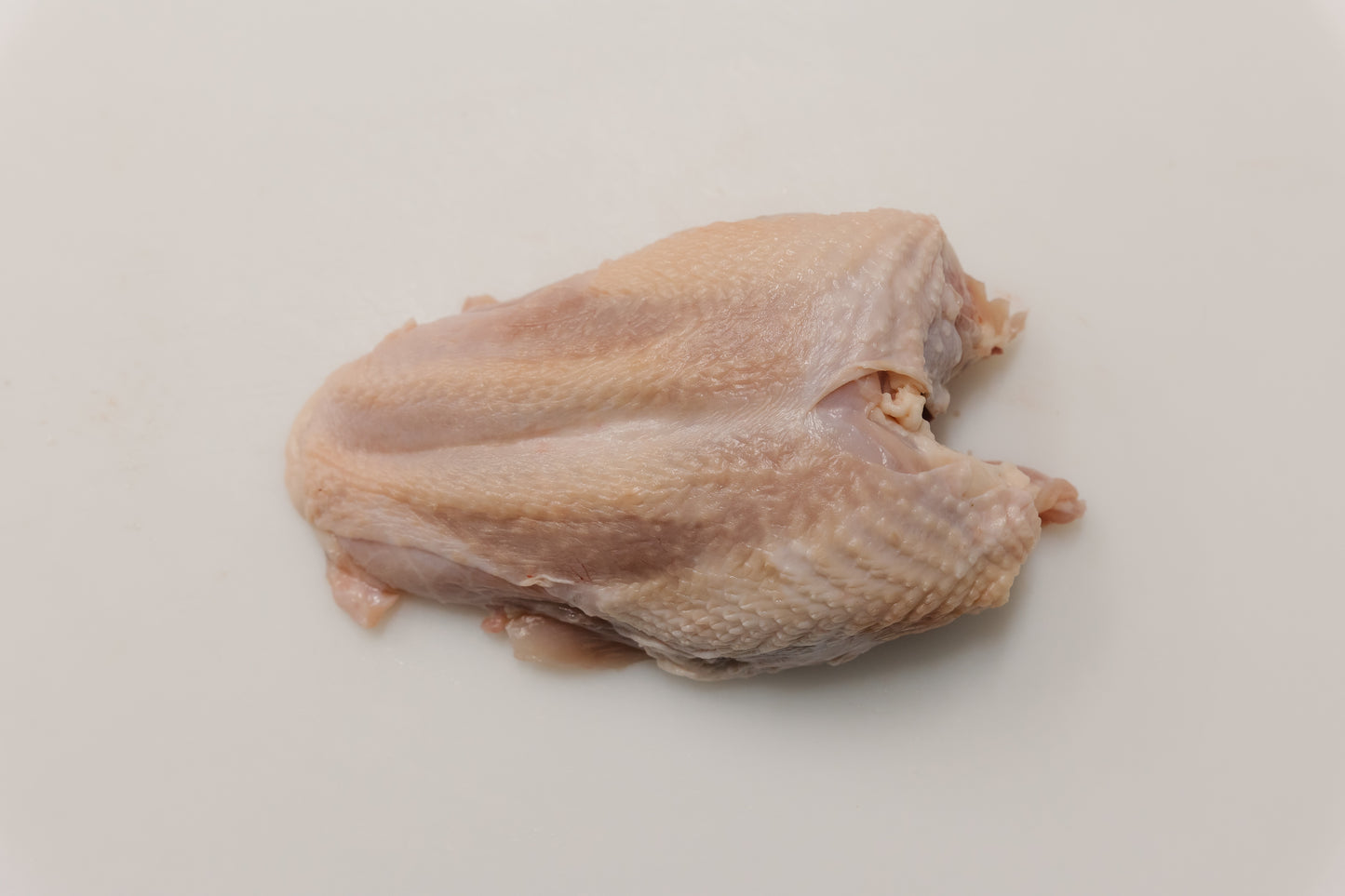 Hähnchenbrust mit Haut und Knochen (600-700g)
