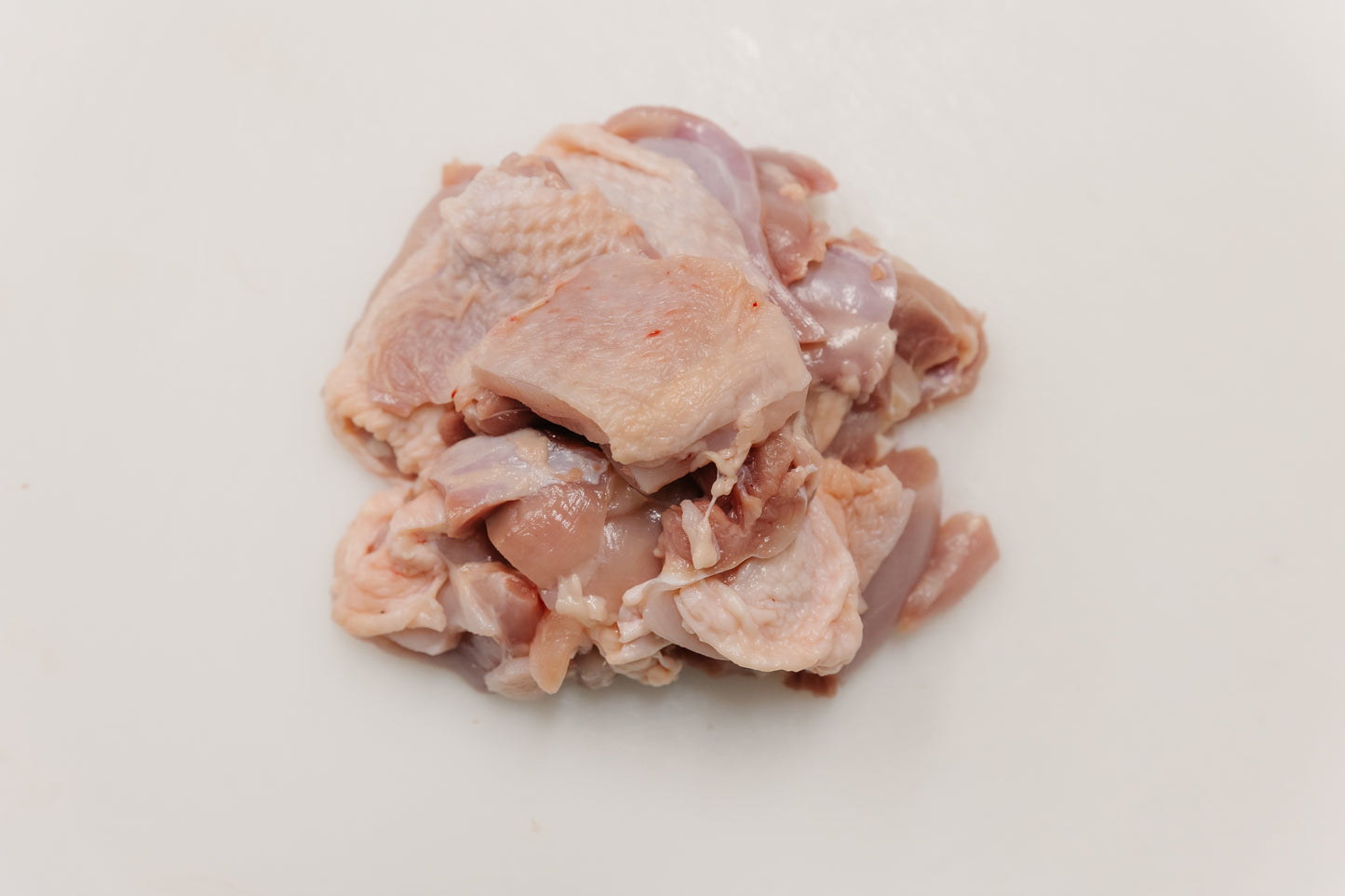 Hähnchenfleisch aus der Oberkeule mit Haut 500g