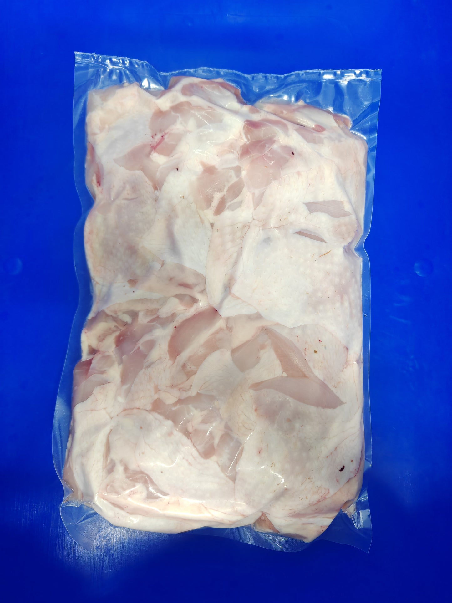 Hähnchenfleisch aus der Oberkeule mit Haut 500g